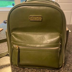 Olive green mini Itzy Ritzy bag with 7 pockets